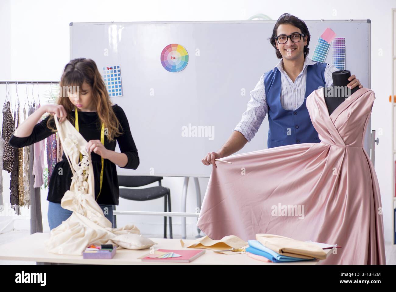 Young tailors working in workshop Stock Photo