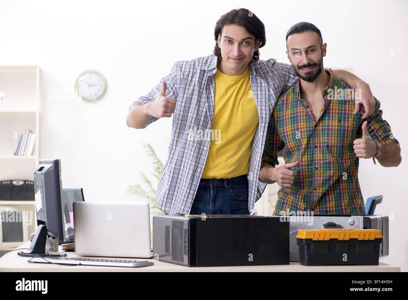 IT engineers working on hardware issue Stock Photo
