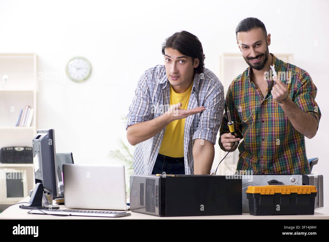 IT engineers working on hardware issue Stock Photo
