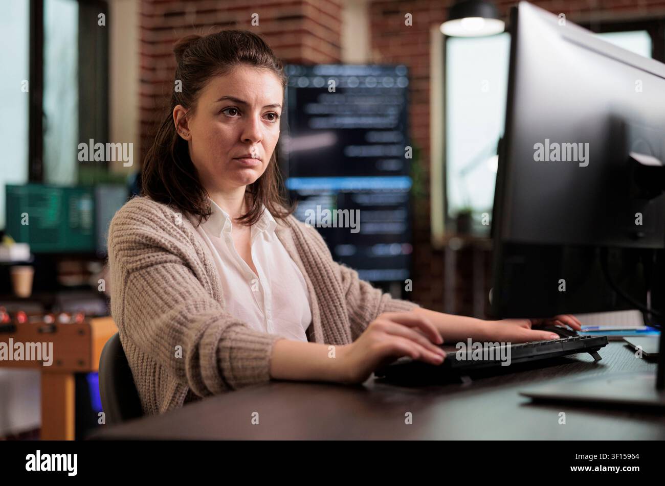 System administrator upgrades firewall for network stability with code, databases and network security work focused on data protection, firewalls and software development Stock Photo