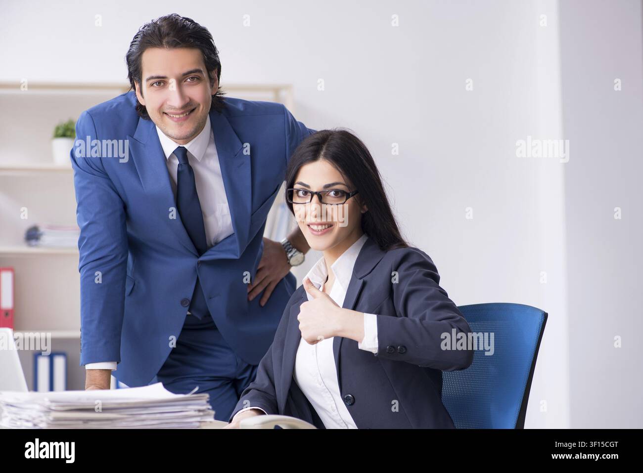 Two employees working in the office Stock Photo