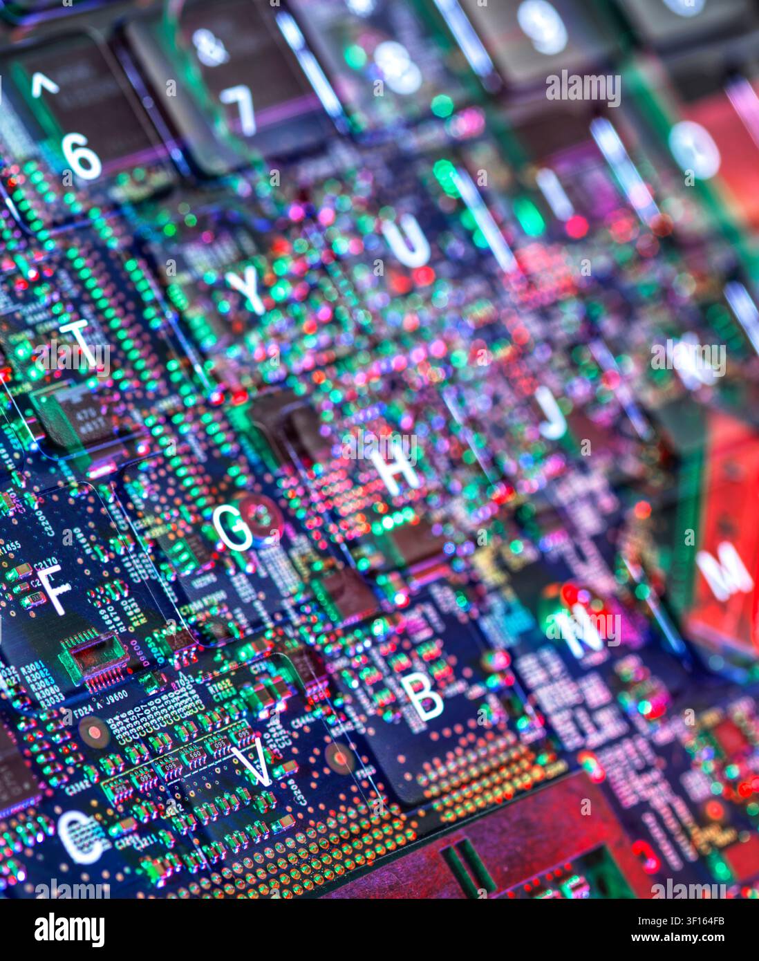Computer hardware. Inside a laptop computer showing computer chips and electronics. Stock Photo