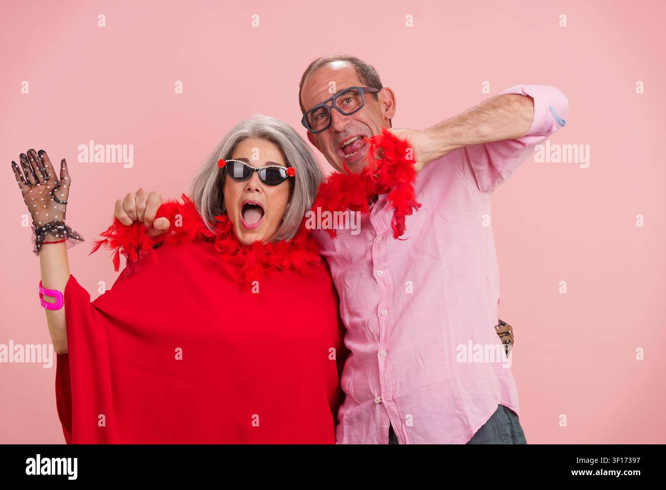 Mature couple having fun celebrating positive active longevity Stock Photo