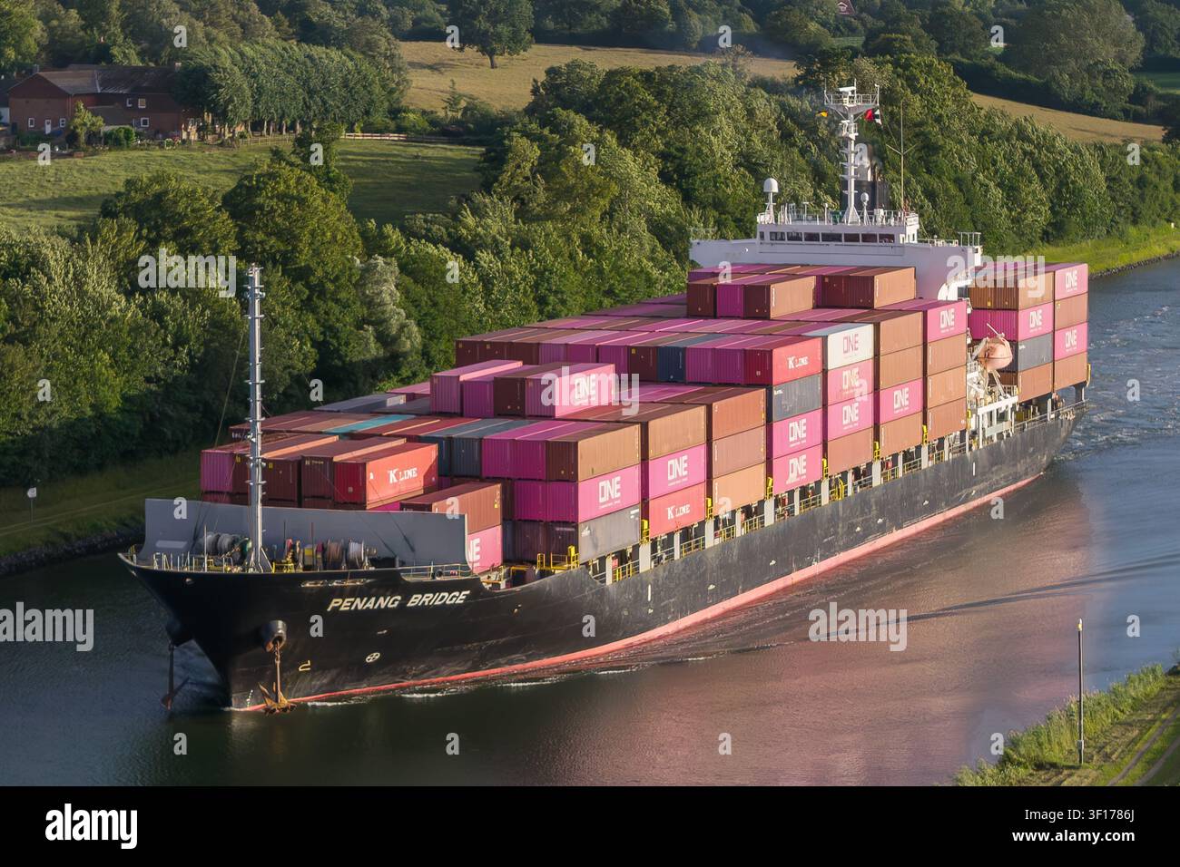 Containership PENANG BRIDGE passing the Kiel canal Stock Photo