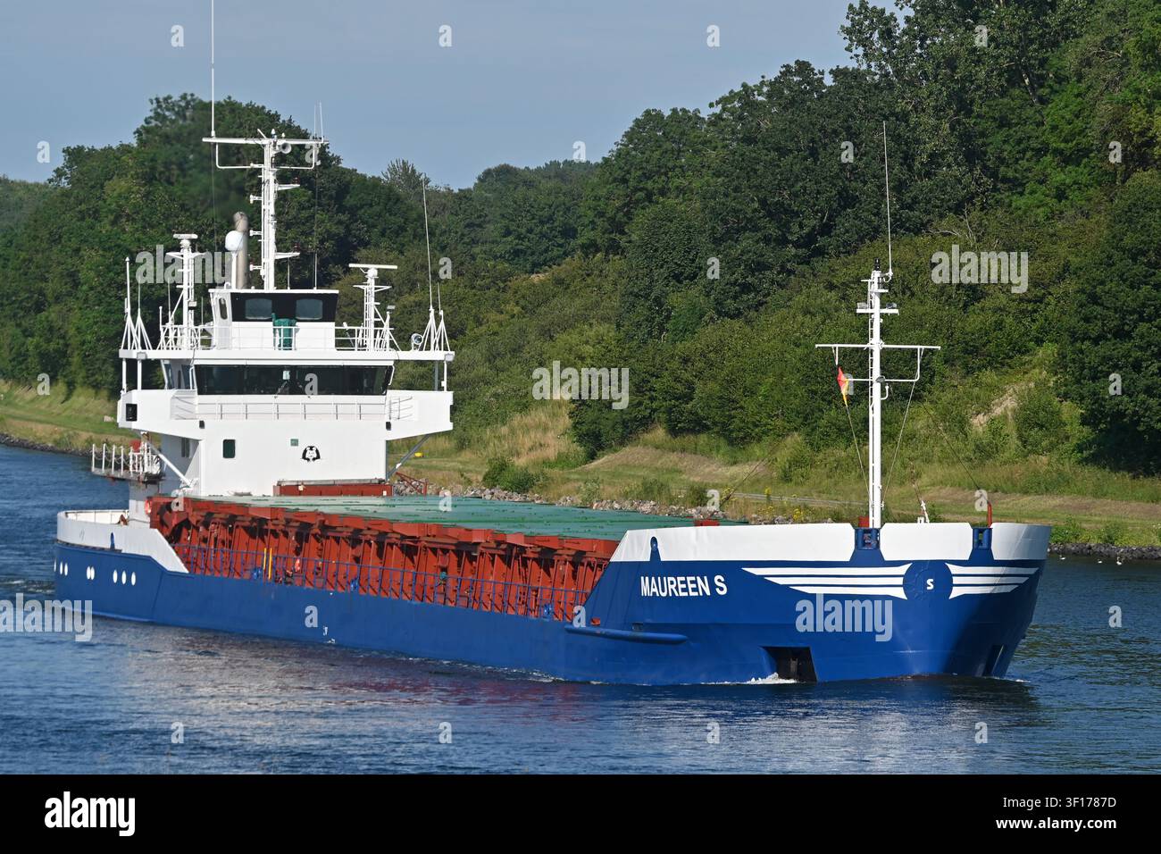 General cargo ship MAUREEN S passing the Kiel canal Stock Photo