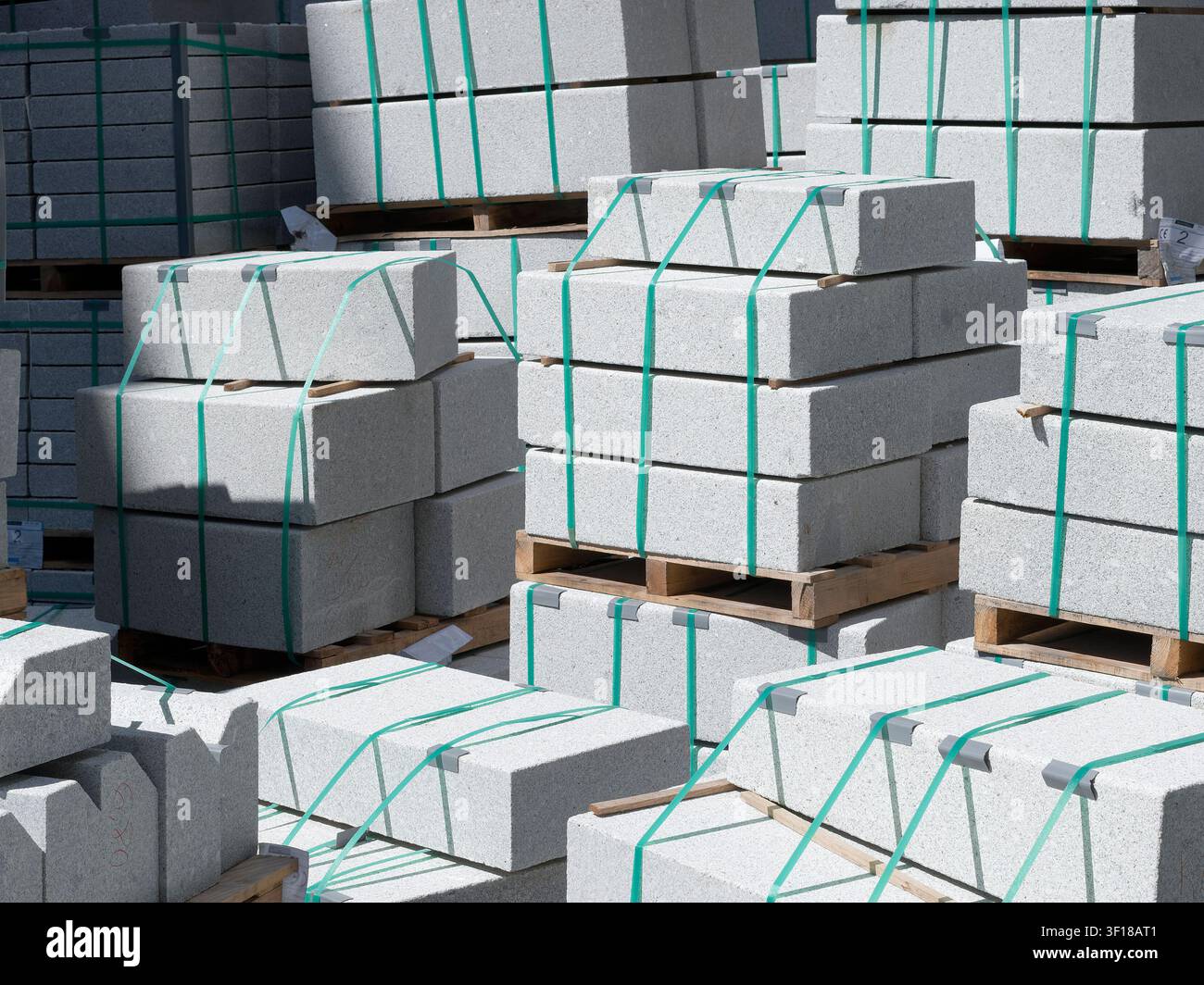 Concrete blocks stacked and stored at construction site Stock Photo
