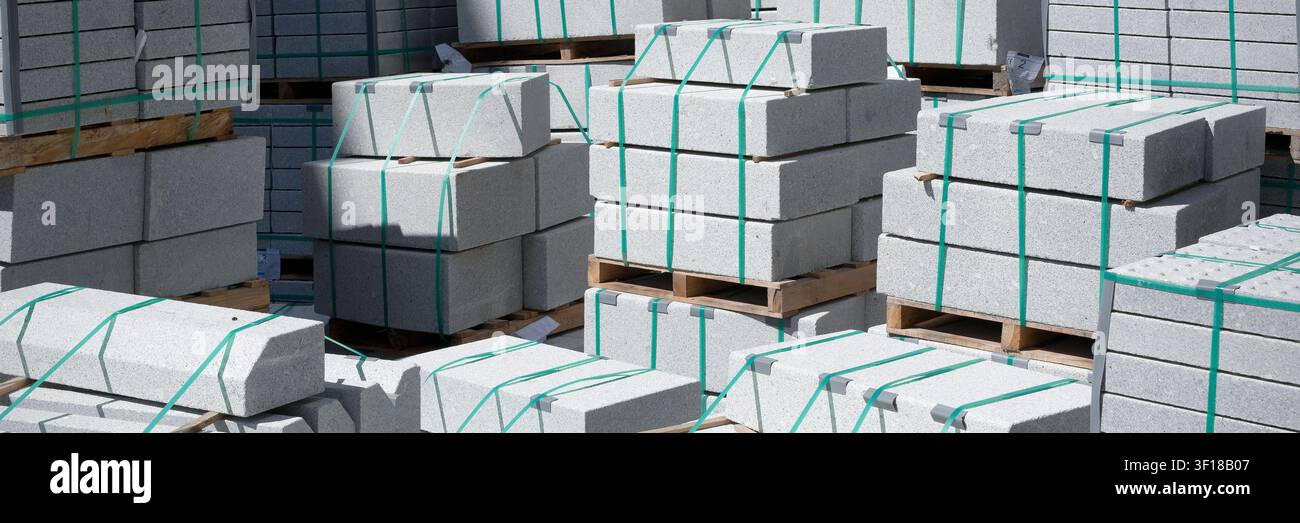 Concrete blocks stacked and stored at construction site Stock Photo
