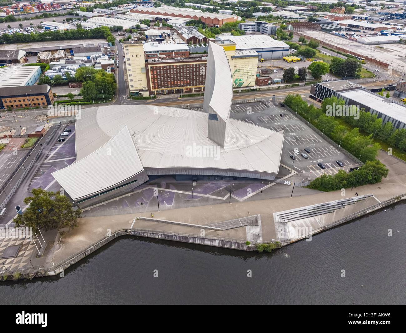 Aerial view of the Imperial War Museum North with its distinctive shard-like architecture situated on the waterfront in Manchester, England, United Ki Stock Photo