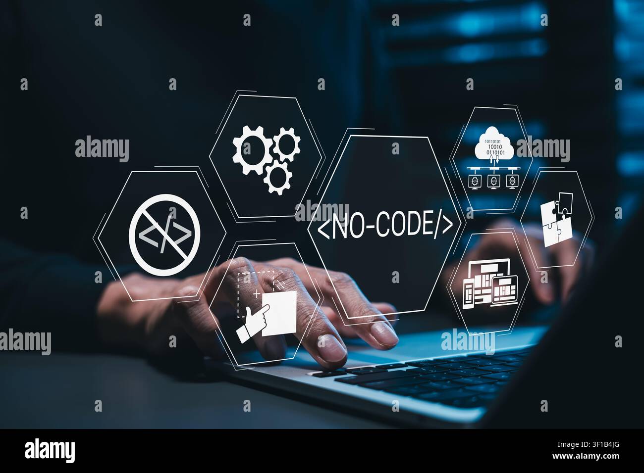 No-code software development and visual programming concept. Programmer using laptop with NO-CODE icons, prohibited coding sign, app builder, Stock Photo