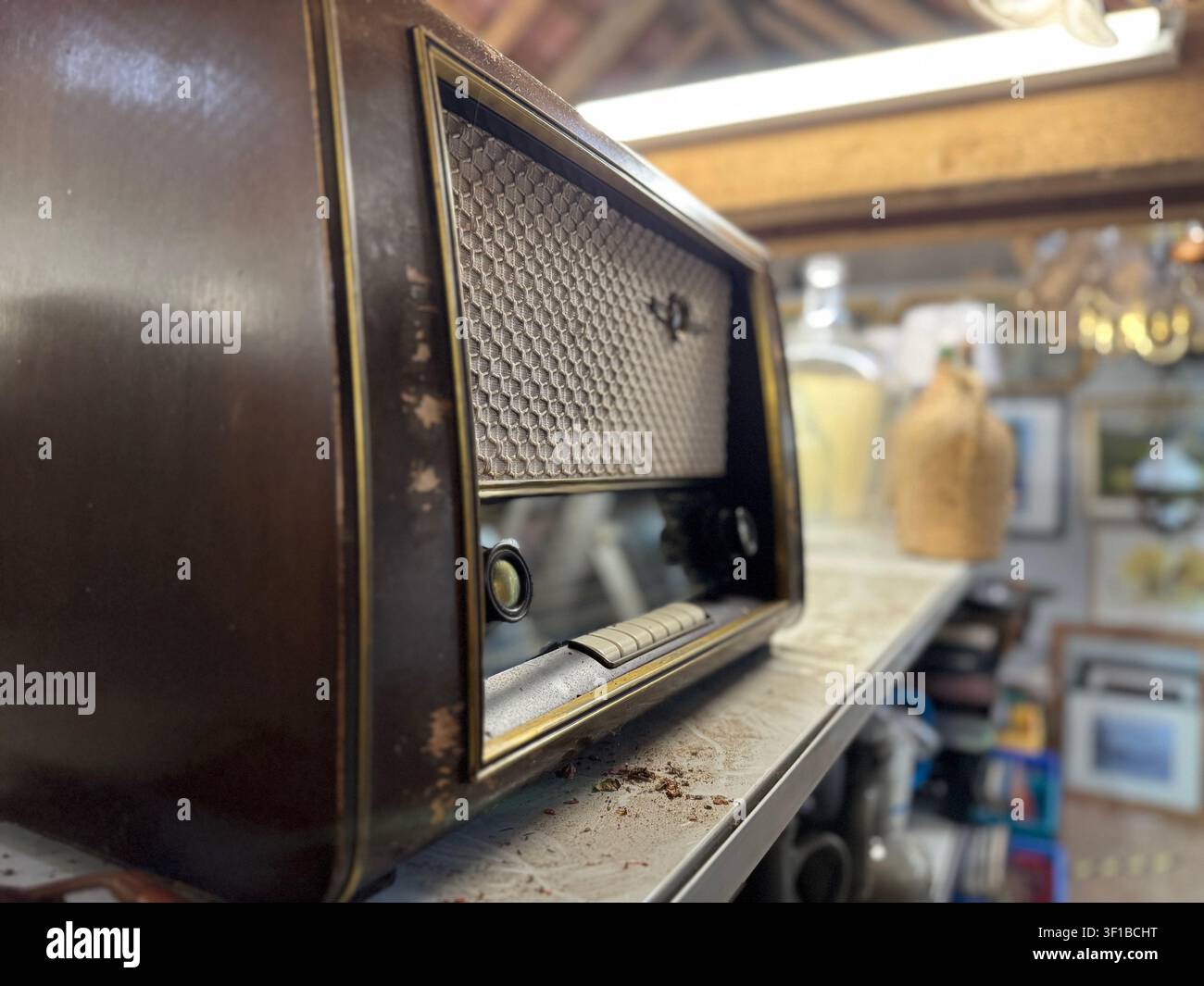 Vintage wooden radio receiver on display shelf Stock Photo