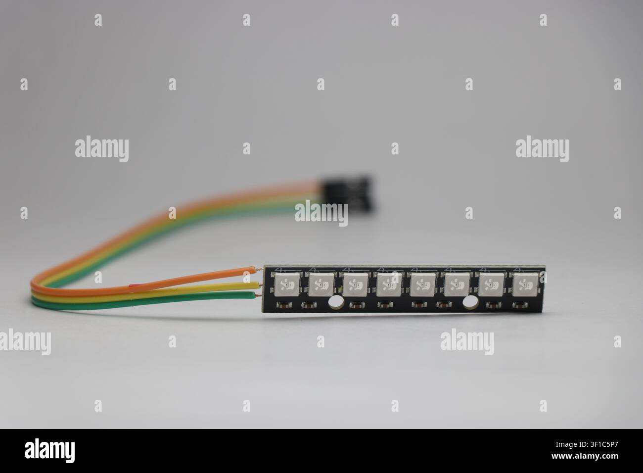 8 led ws2812b strip with soldered jumper wires for electronics Stock Photo