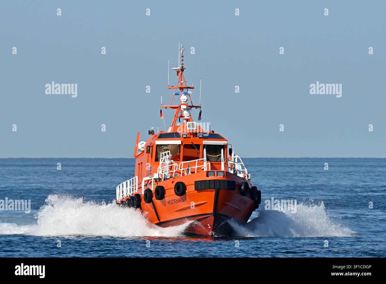 Pilot boat HOLTENAU operating at Lübeck-Travemünde Stock Photo