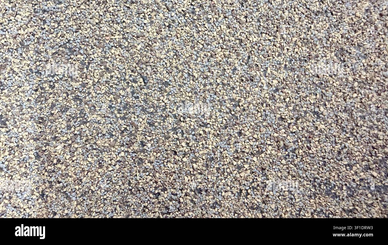 Beige gravel texture close up Stock Photo