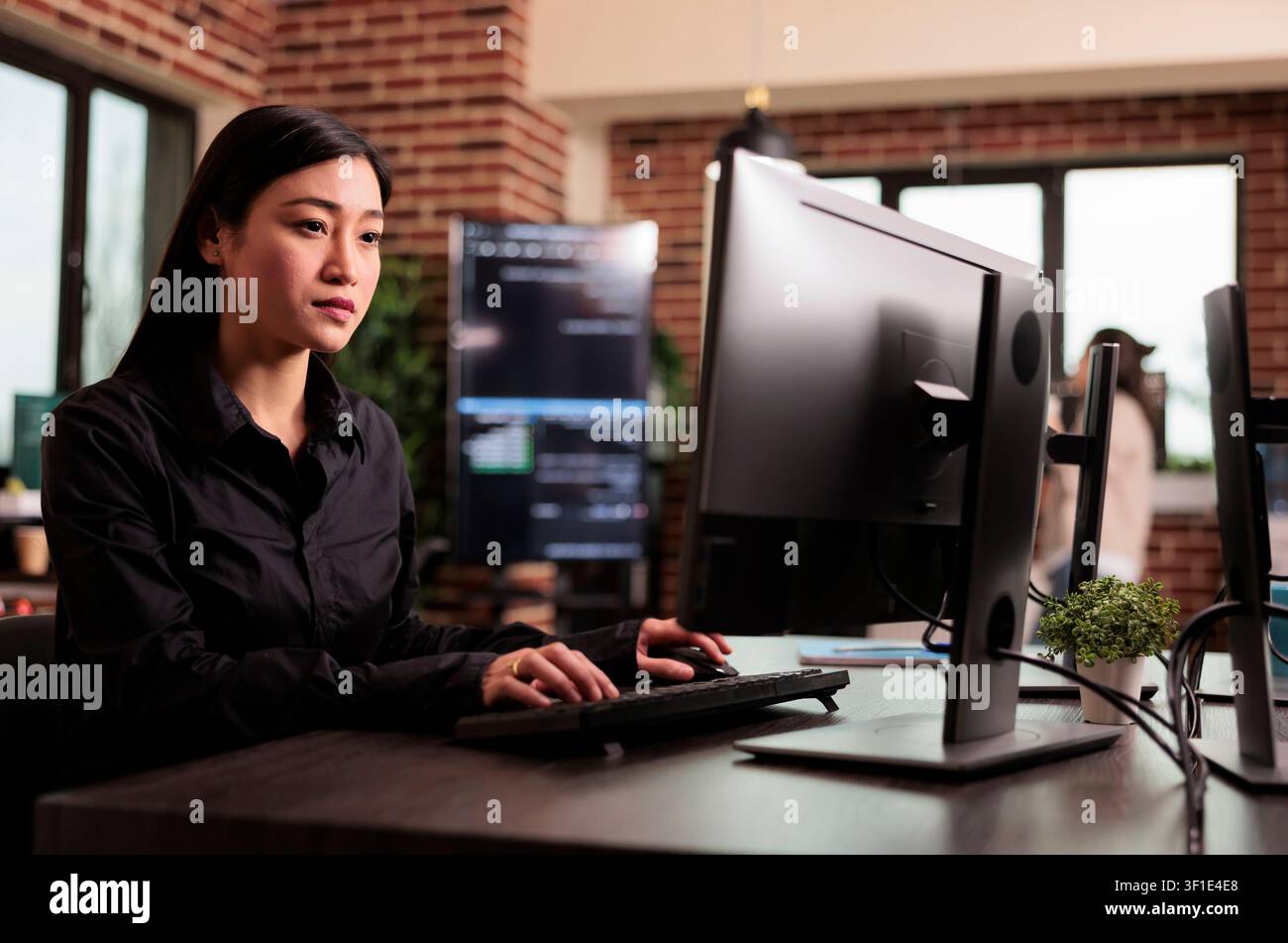 Freelance coder programming server code algorithm on computer, typing server data in it agency office, programming engineer working on new user interface with online system to create algorithm. Stock Photo