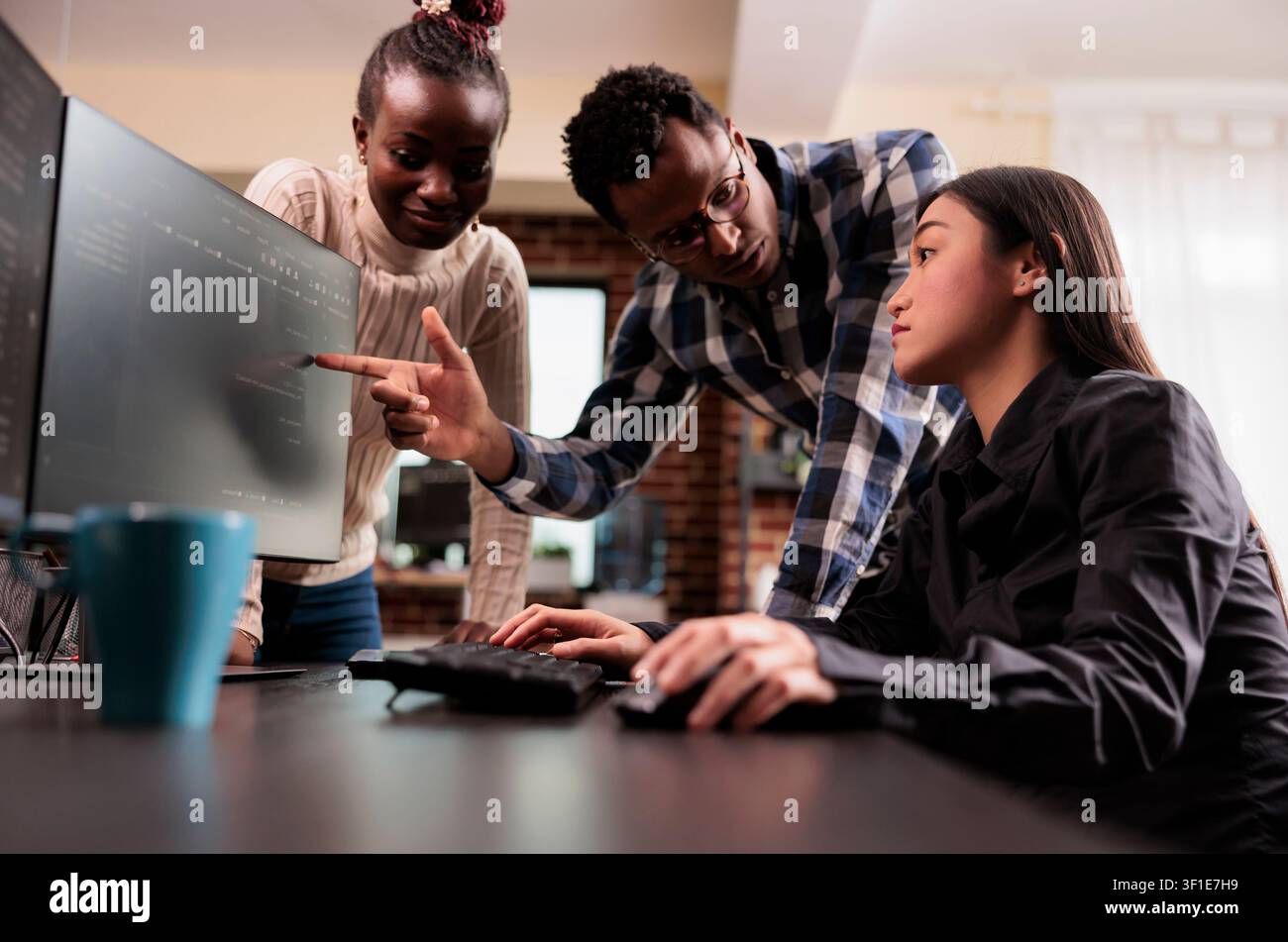 Diverse software developer analyzing html script information on programming computer, parsing source code in it data agency. Tech enginners compiling app language innovating online server algorithms. Stock Photo