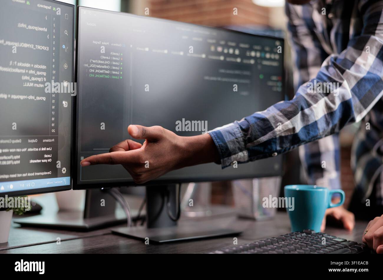 Blockchain engineer points out a mistake in network security code, showing software development, system updates and technical problem solving. Stock Photo