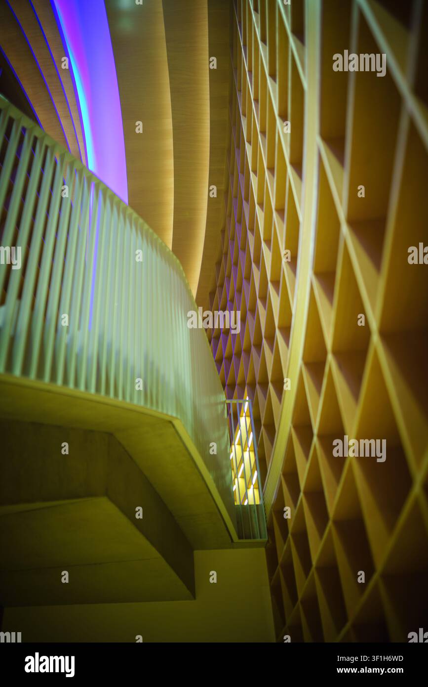 Abstract architectural design featuring geometric patterns and lighting effects. Stock Photo