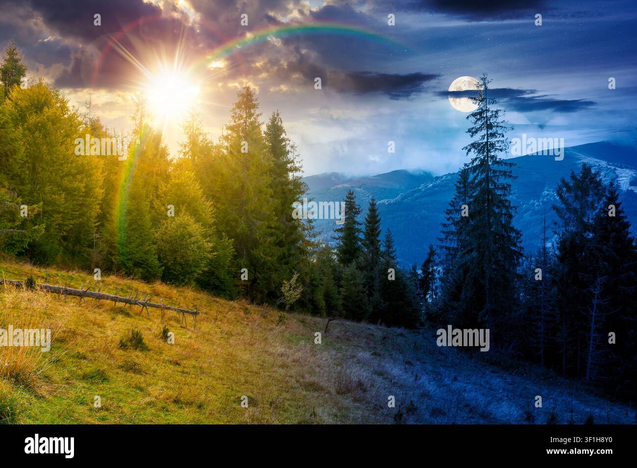 mountain landscape ukraine with spruce forest. day meet night. sun and moon over rural valley of podobovets in the distance. epic sky. equinox backgro Stock Photo