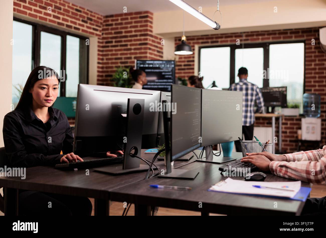 Tech enginners programming server code algorithm on computer, typing sever data in it agency office. Software developer working on new user interface with online system to create algorithm. Stock Photo