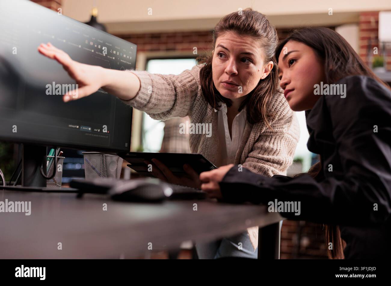 Engineers analyzing HTML code for AI project featuring planning artificial intelligence project, Web developers working on machine learning software. Stock Photo