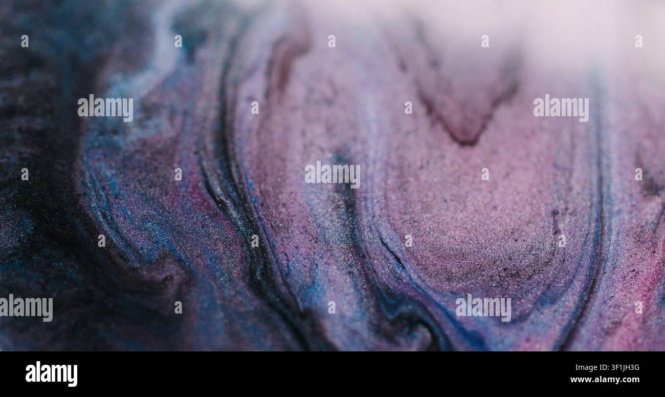 Sparkling ink defocused paint blob liquid spill Stock Photo