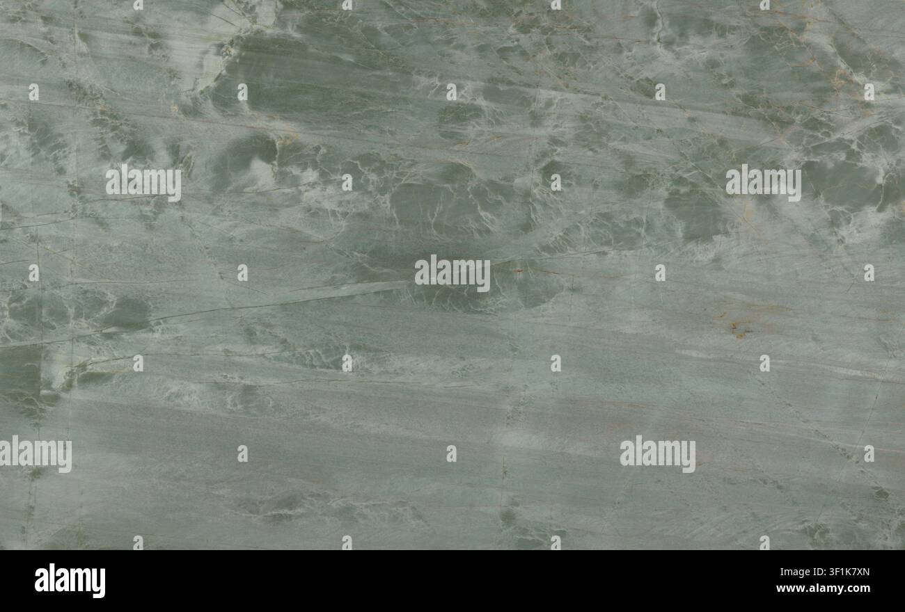 Natural green quartzite stone surface with fine white veining patterns. Stock Photo