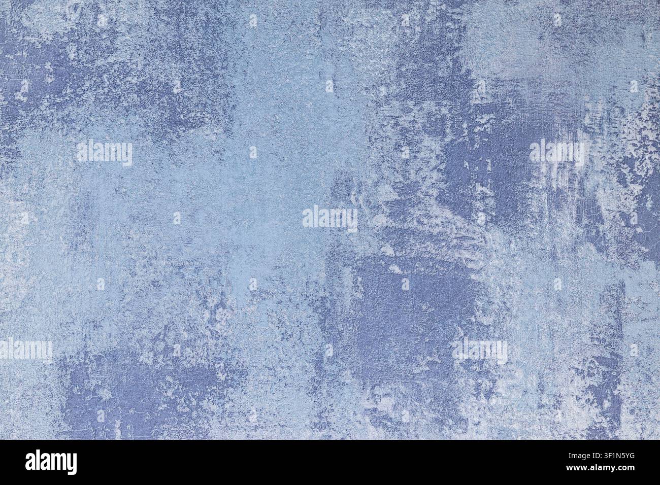 Blue textured wallcovering background with distressed plaster effect Stock Photo