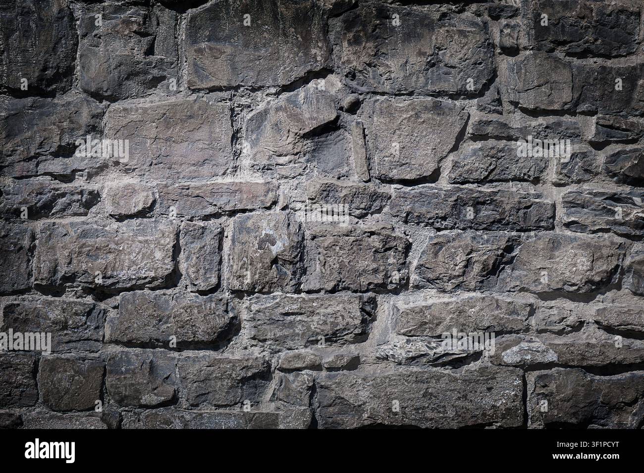 Gray Stone Wall Texture Background, Rough Masonry Surface Stock Photo