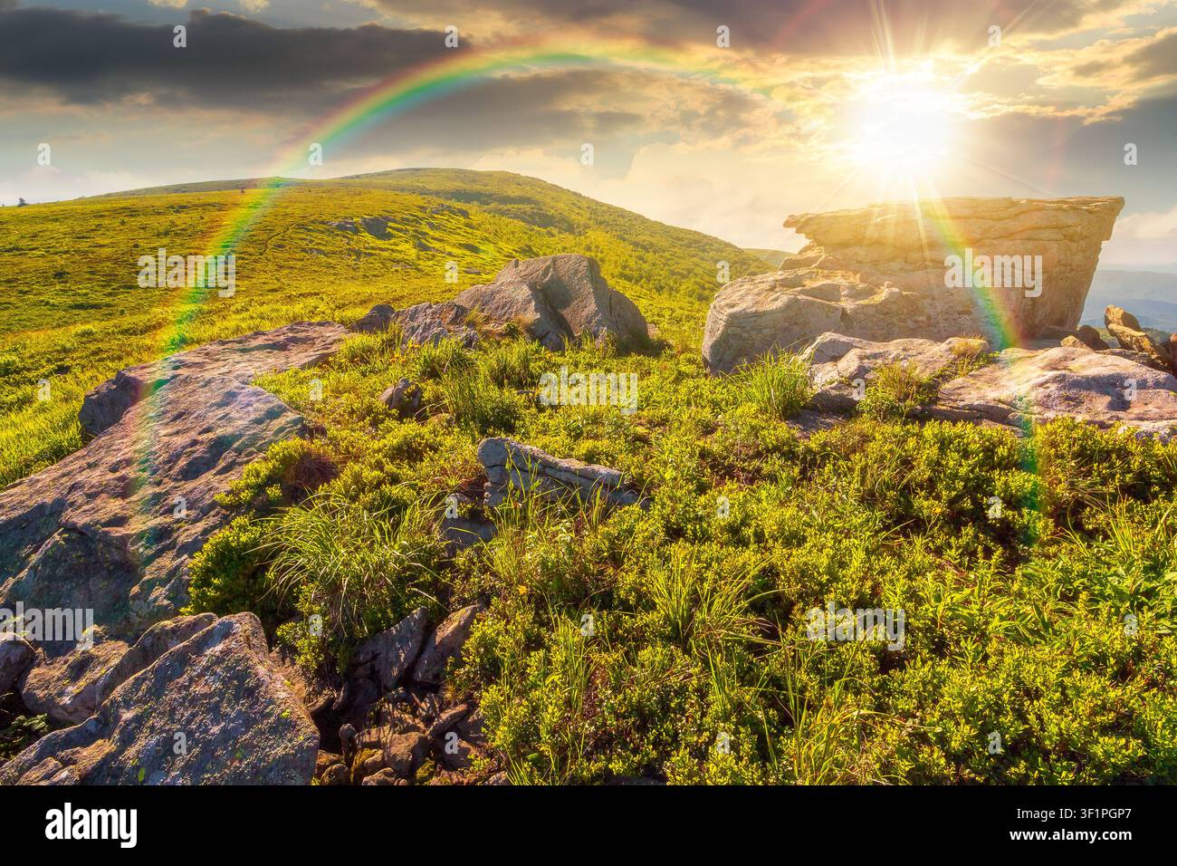 sunset over mountain landscape in summer. beautiful outdoor scenery of carpathian mountains. grassy slopes with rocks. image for ukraine travel backgr Stock Photo