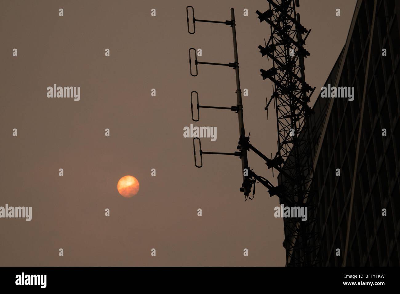 The sun is hazy with smoke in Toronto as wildfire smoke fills the city