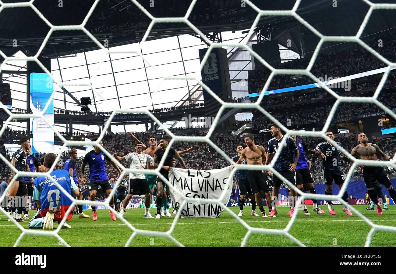 Argentina players hold up a banner with the words 'Las Malvinas son Argentinas' which translates to 'The Malvinas are Argentine' following victory in the FIFA World Cup 2026 semi-final match at the Atlanta Stadium. Picture date: Wednesday July 15, 2026. Stock Photo