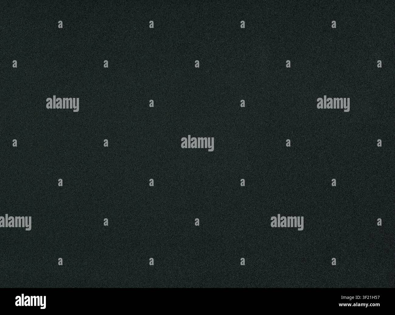black plastic texture with noise speckles useful as a background Stock Photo