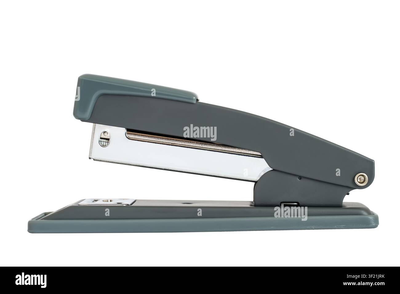 Modern office stapler on a white background. Stapler close-up side view. Stock Photo