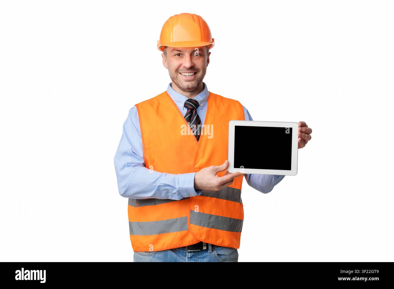 Construction Worker Holding Tablet With Blank Screen, Studio Shot, Mockup Stock Photo