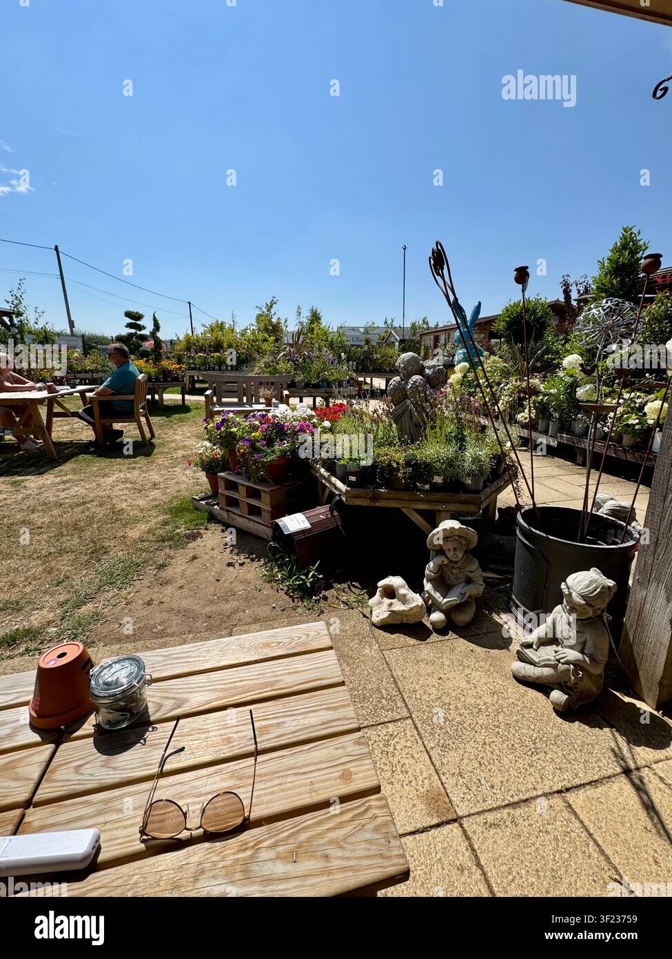 Kesgrave, Suffolk, UK ,  16 July 2026 : Kiln Farm amd garden nursery on a hot summer afternoon. - Smartphone Captured Stock Image