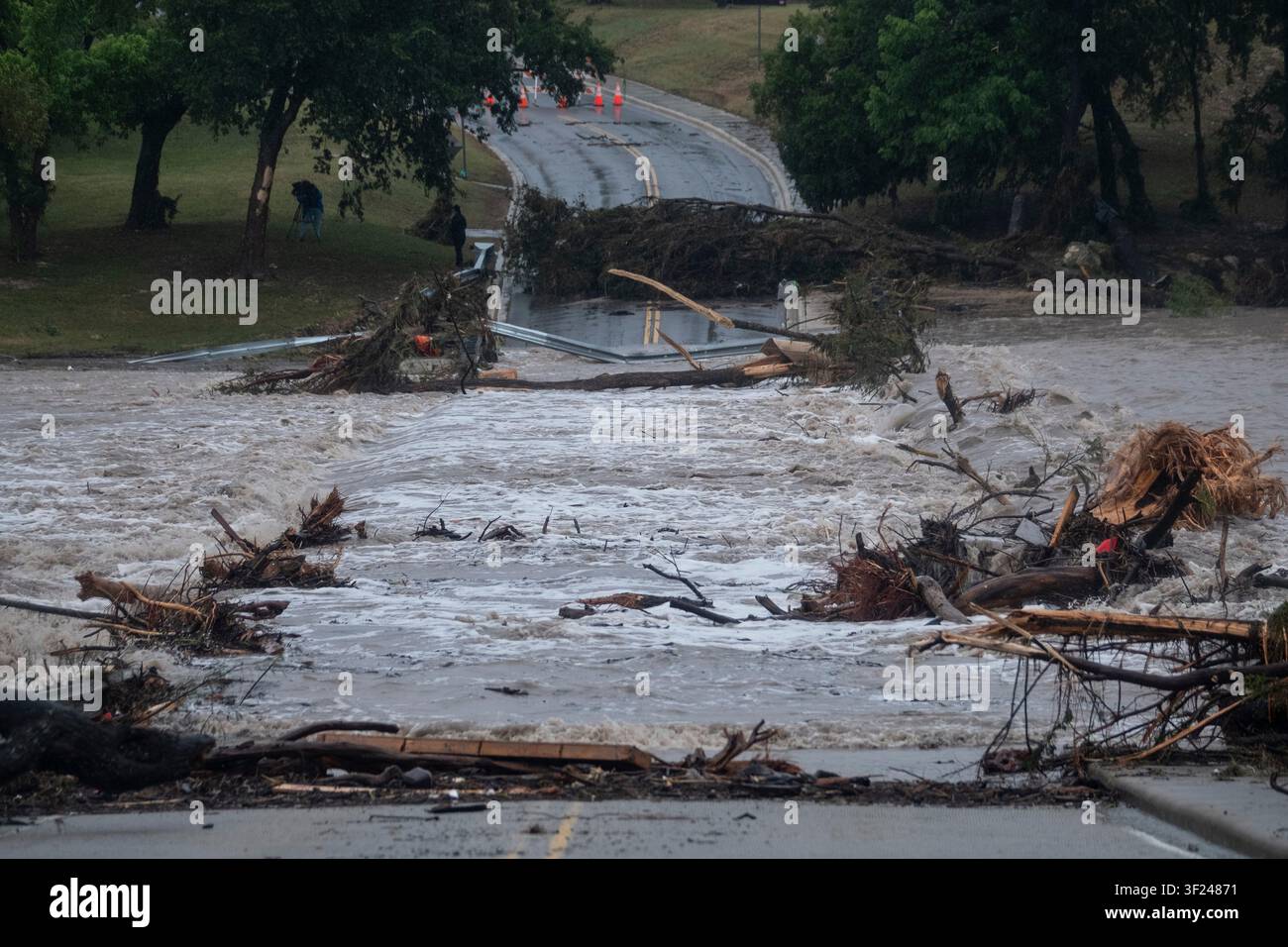 Flooding blocks off G Street along the Guadalupe River on Thursday