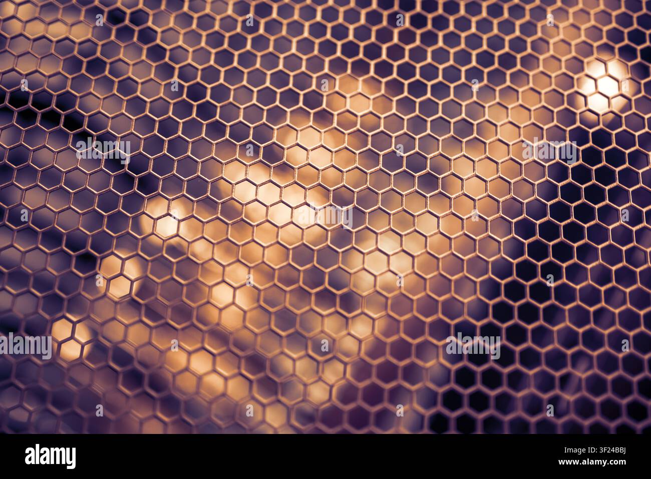 A close-up image showcasing a hexagonal glass surface pattern with intricate geometric design, creating an abstract and modern visual effect suitable Stock Photo