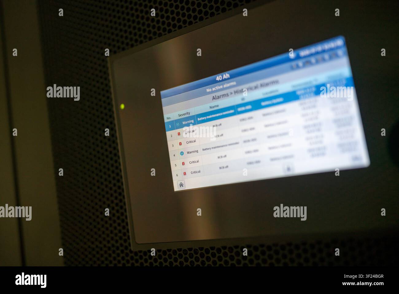 A digital security alarm panel displaying alert statuses and notifications, used for monitoring and managing security systems in commercial or residen Stock Photo
