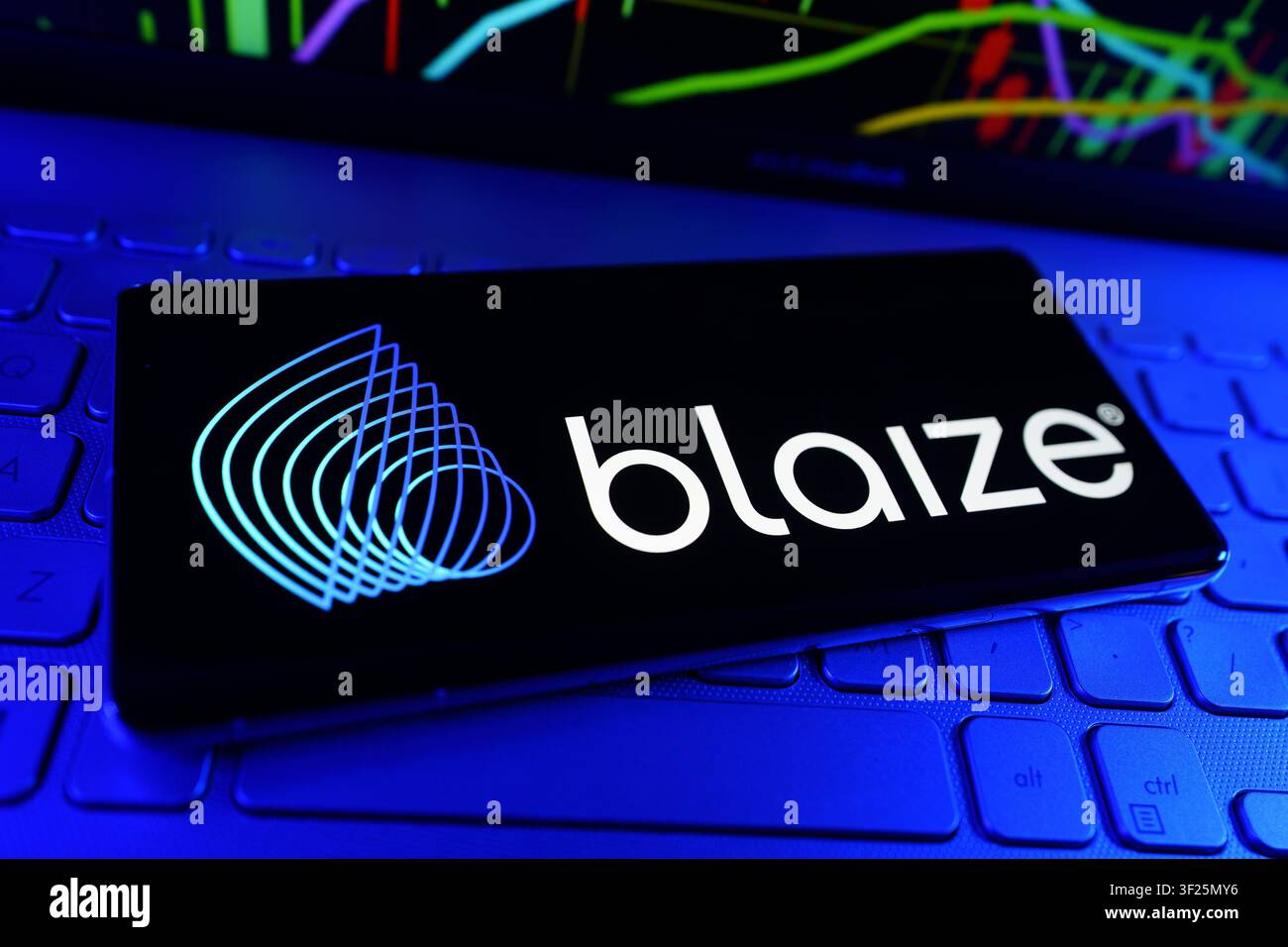 Blaize Artificial Intelligence Semiconductor Company Logo On Smartphone With Stock Market Financial Performance Chart Stock Photo