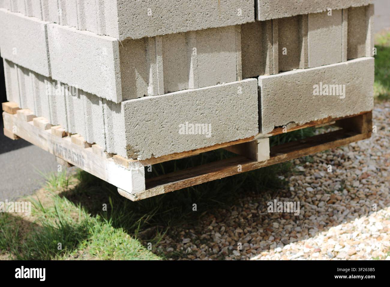 Grey concrete blocks stack delivery Stock Photo