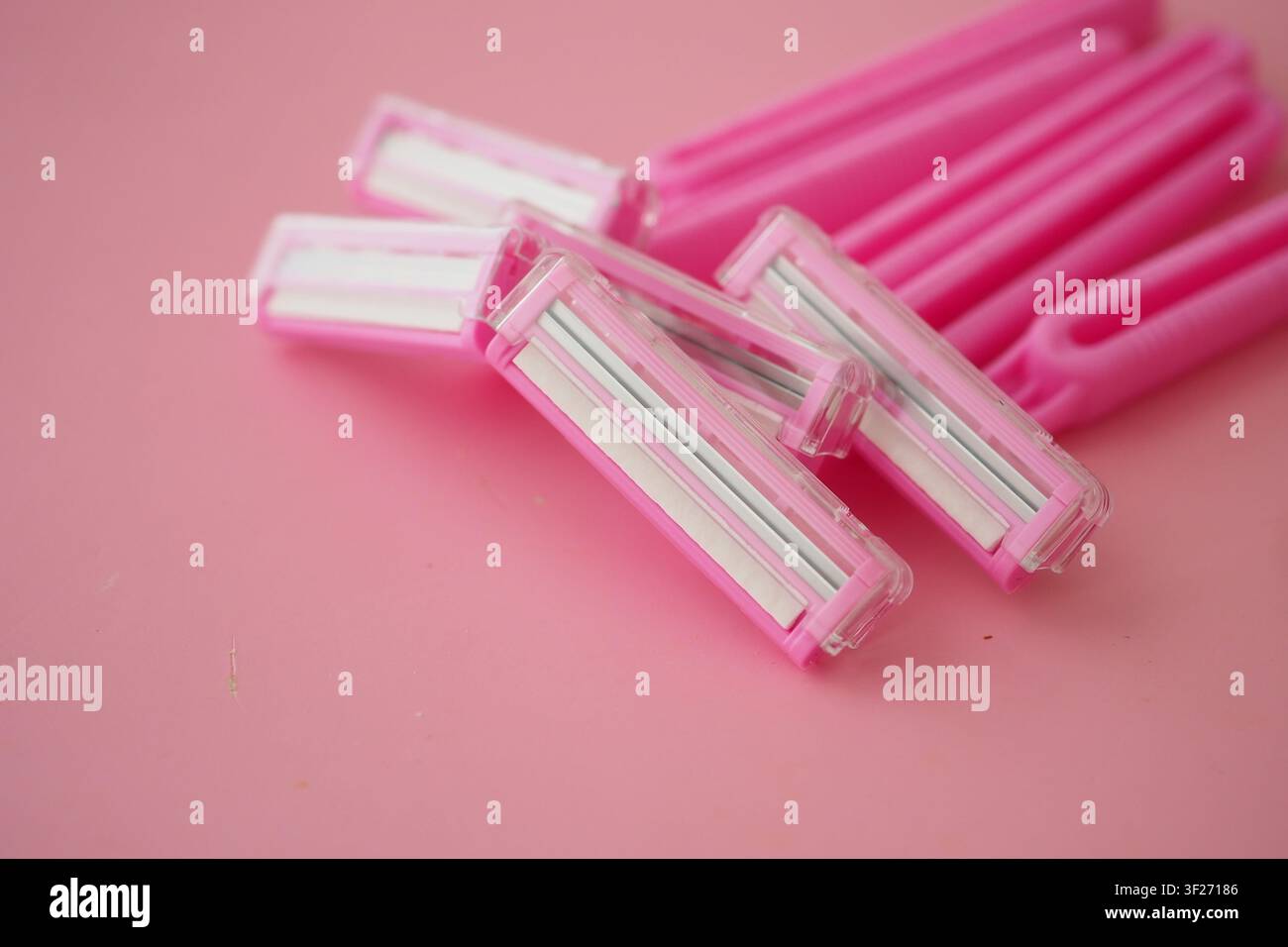 Pink tools arranged on a pink background Stock Photo