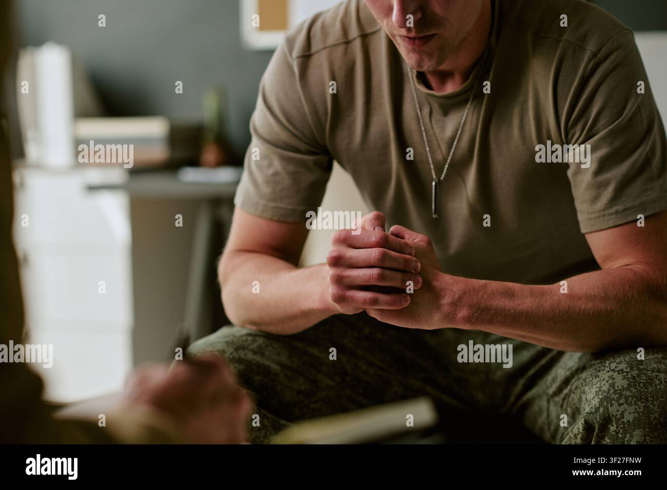 Soldier Discussing Recovery Plan in Military Hospital Stock Photo