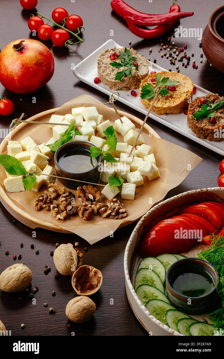 Assorted Georgian appetizers on a wooden table Stock Photo