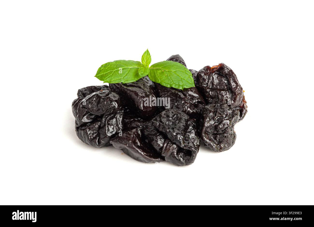 Dry Plums Isolated, Dried Black Fruits Pile, Prune Group, Natural Dessert, Healthy Diet, Dry Plum Fruit on White Background Stock Photo