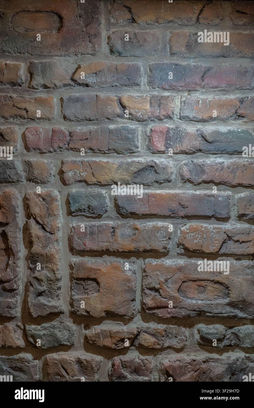 Old weathered brick wall texture background, rustic exposed brickwork with rough surface for interior design Stock Photo