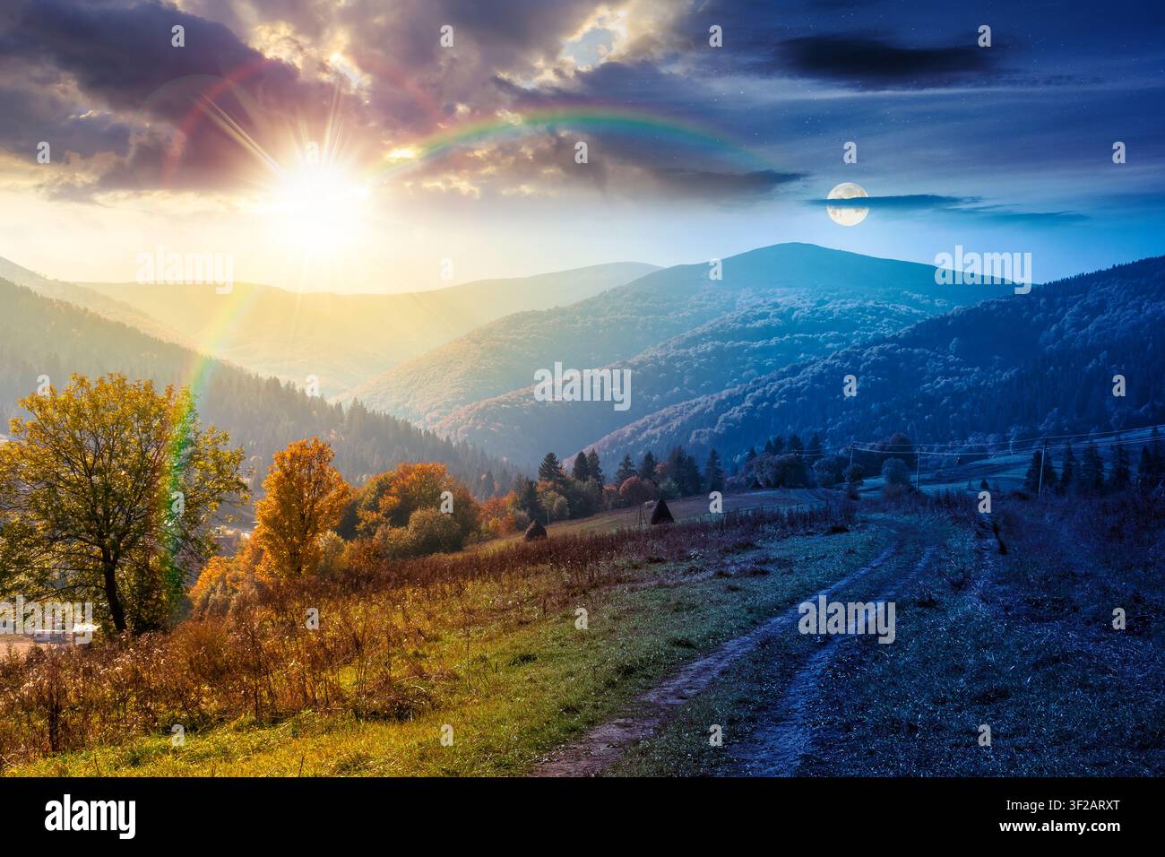 countryside mountain landscape on autumn equinox. weathered grassy field on a hill near forest. rural background. alpine highland of ukraine at twilig Stock Photo