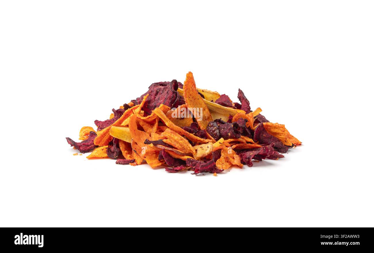Parsnips, sweet potato, carrot and beetroot chips isolated, dry vegetable root mix, healthy snacks pile on white background Stock Photo