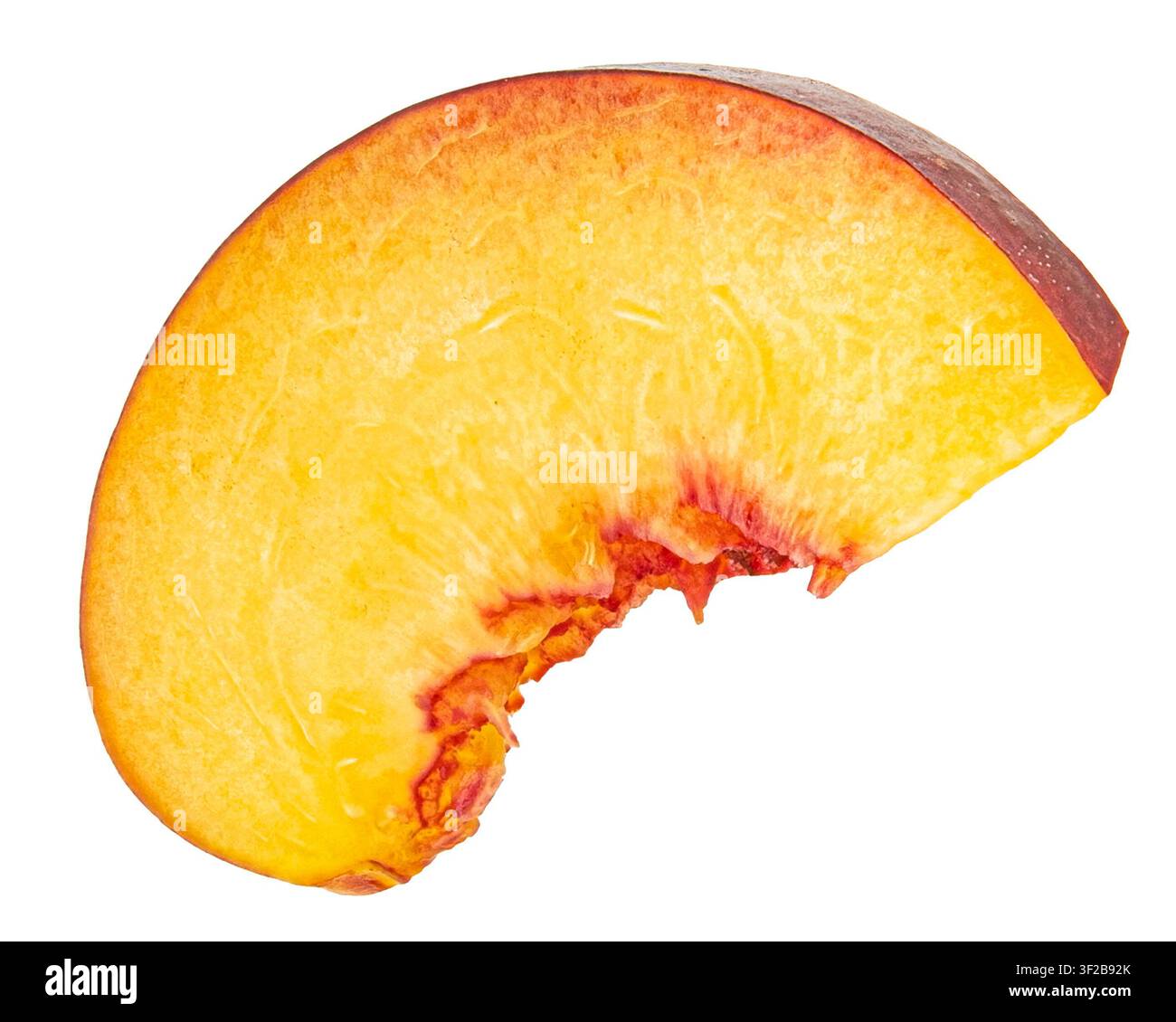 Falling peach slice isolated on white backgroundw Stock Photo