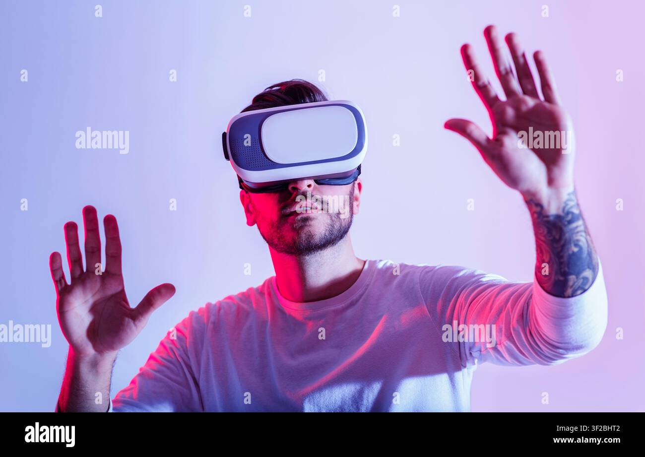Modern digital entertainment. Man uses virtual glasses Stock Photo