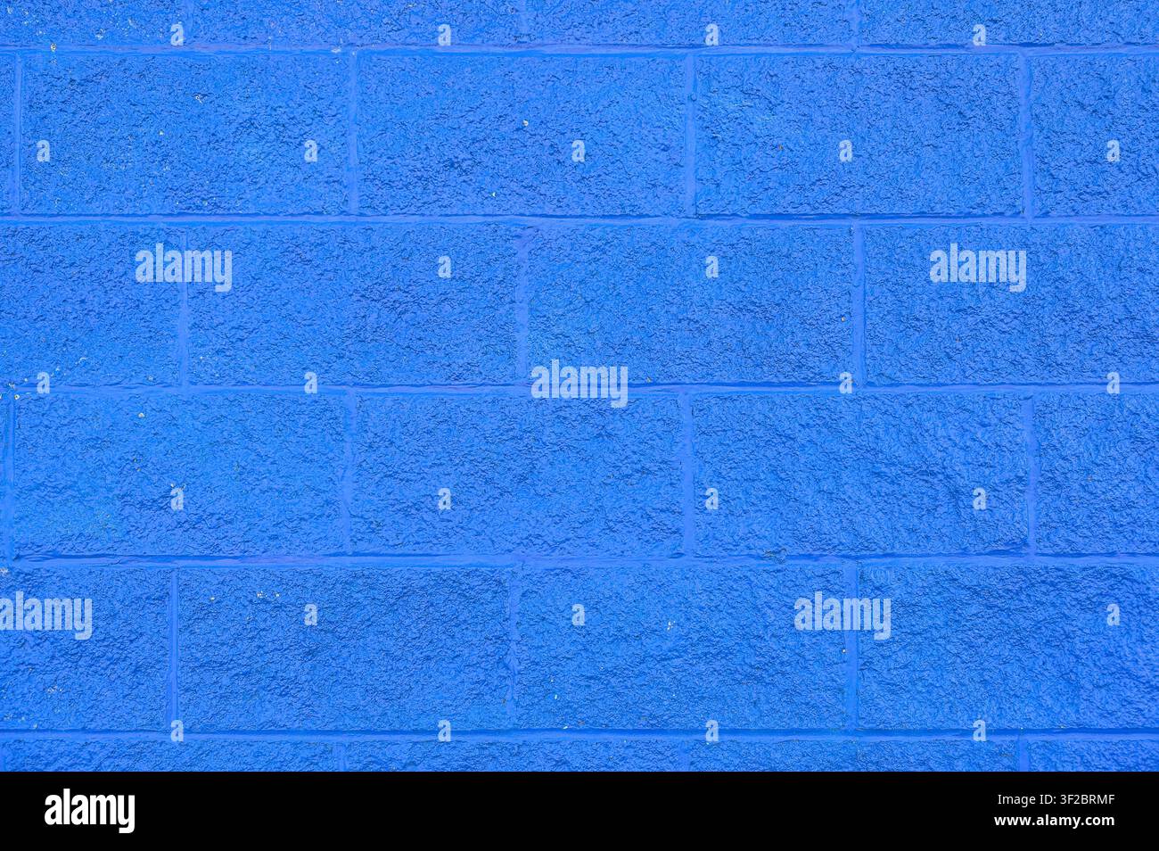 Blue painted brick wall texture background. Stock Photo
